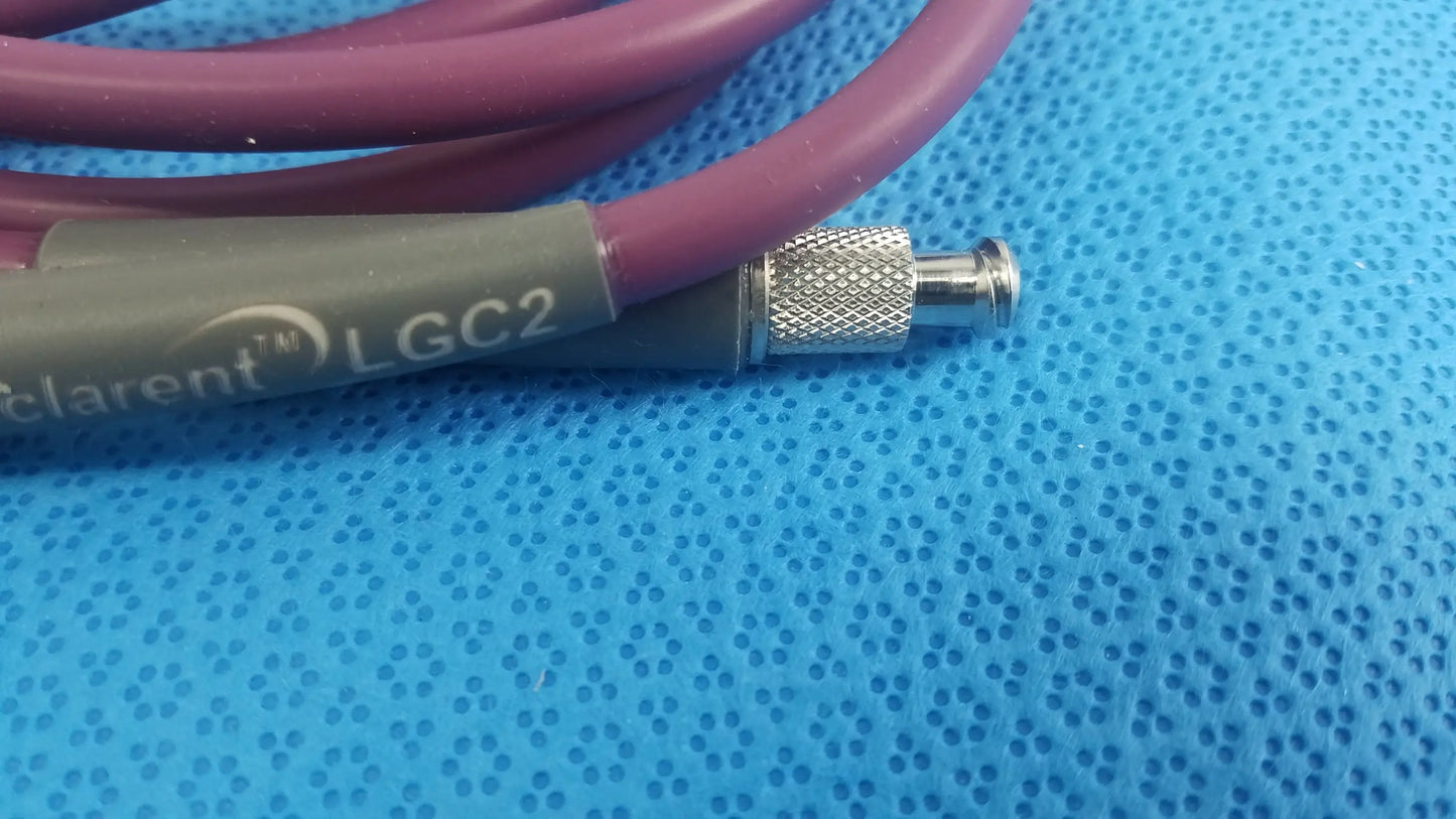Maroon-coated acclarent lgc2 fiber optic light guide cable with gray label and silver metallic connector for medical equipment reuse