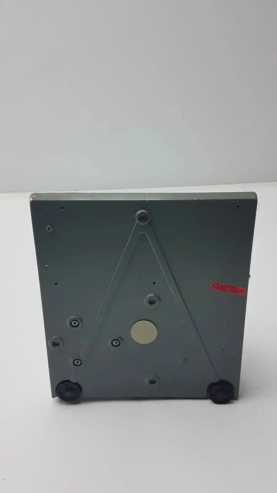 Gray metallic baker universal cd case with black rubber feet and central hole for prescription weighing class ii g-box12-33i