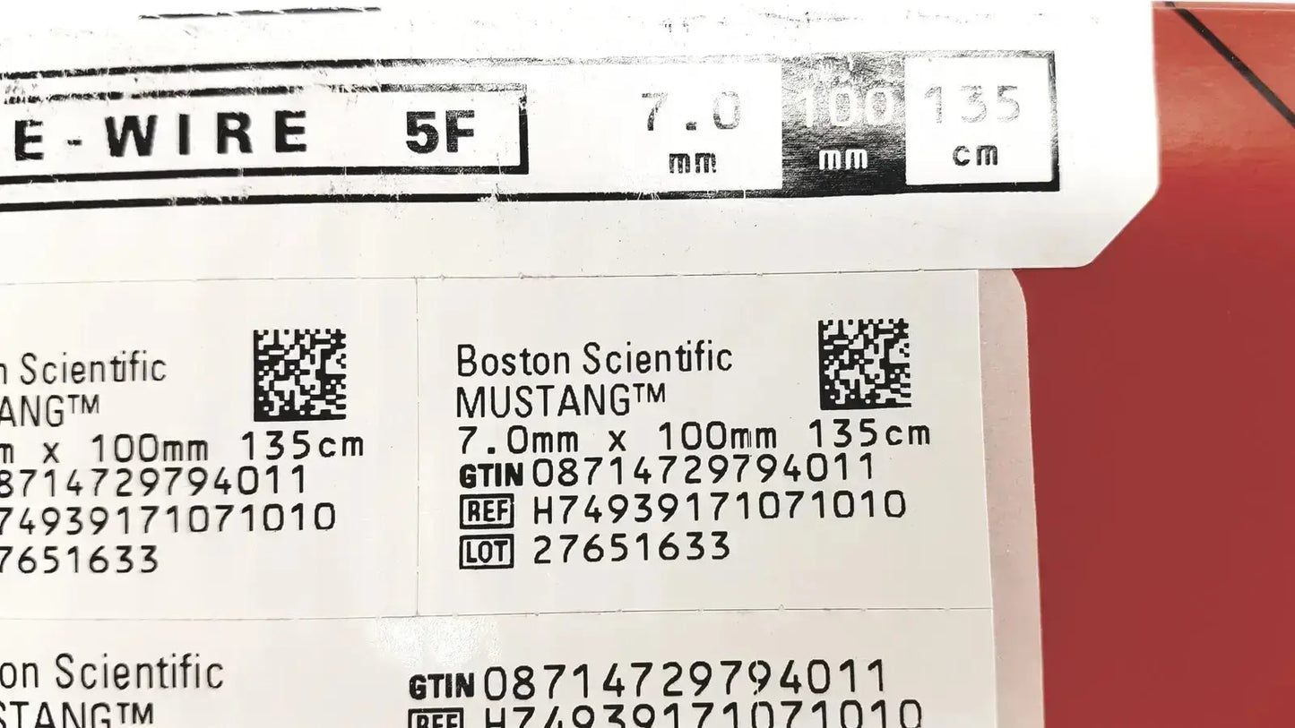 Boston scientific mustang otw medical wire 7.0mm x 100mm with label and barcode on white against red background