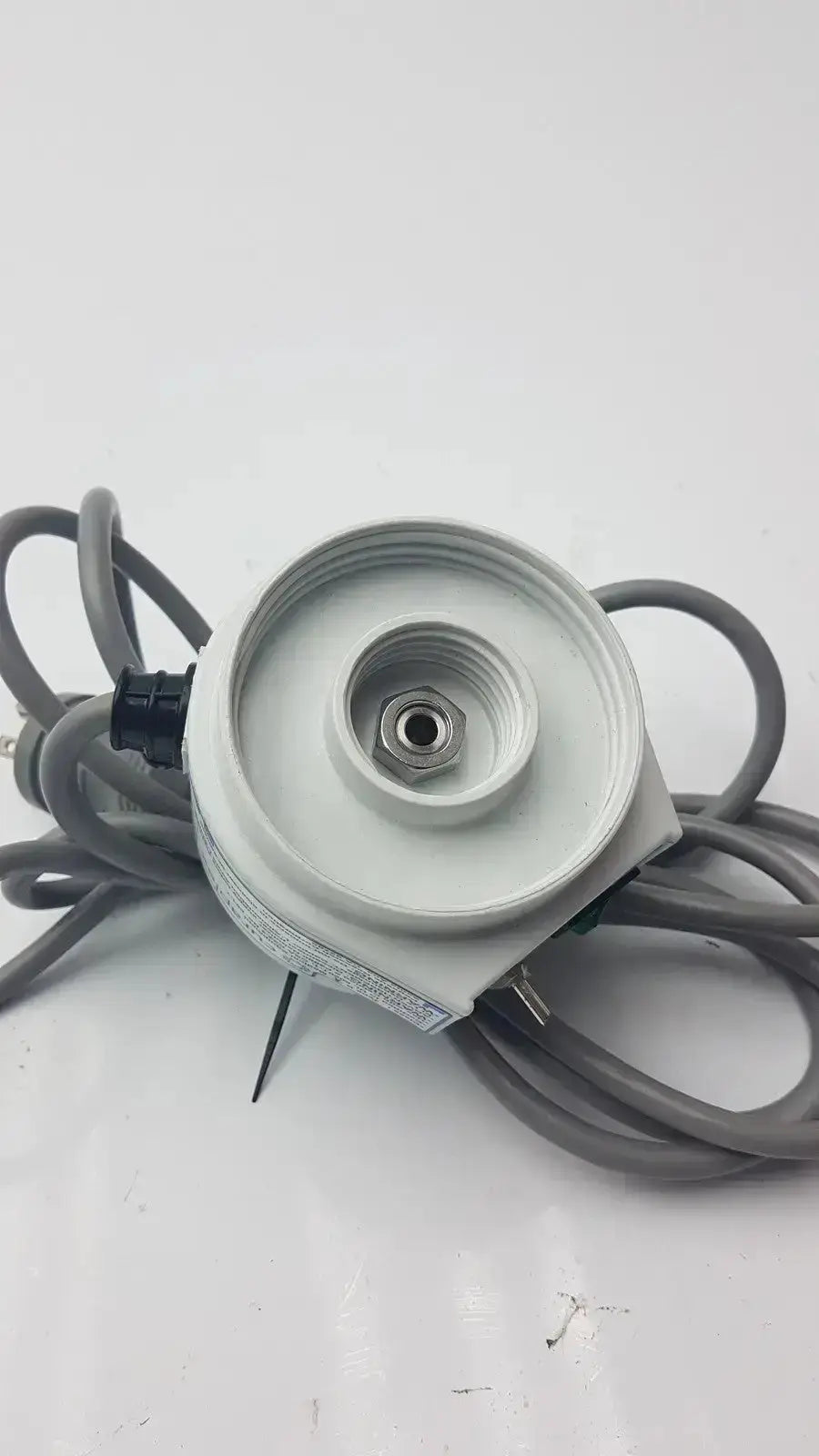Gray plastic electric motor with coiled gray power cord and black connector for curaplex 301-p2001 humidifier heater p2001c