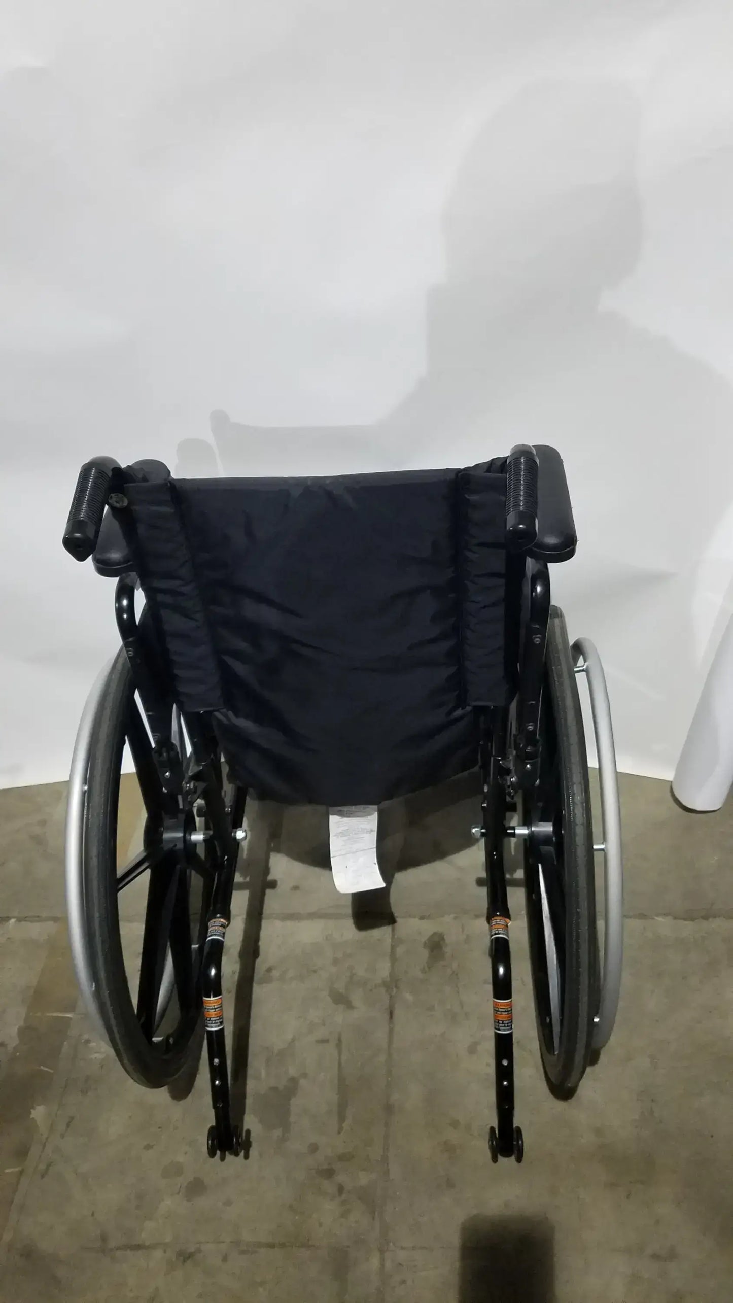 Invacare Tracer SX5 Folding Wheelchair – Black Finish with Padded Arm Supports