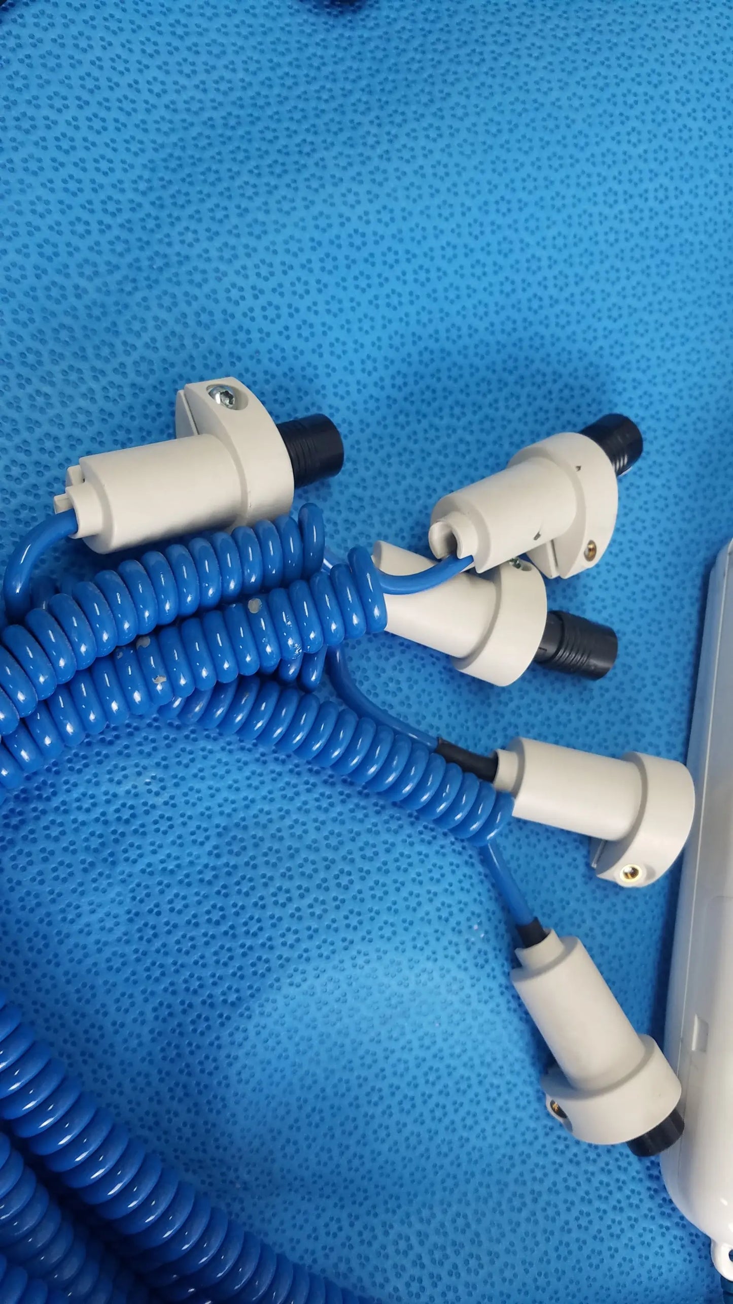 Lot of 4 coviden genius 2 tethered tympanic thermometers with white plastic sensor connectors black tips and blue cables for reuse medical equipment