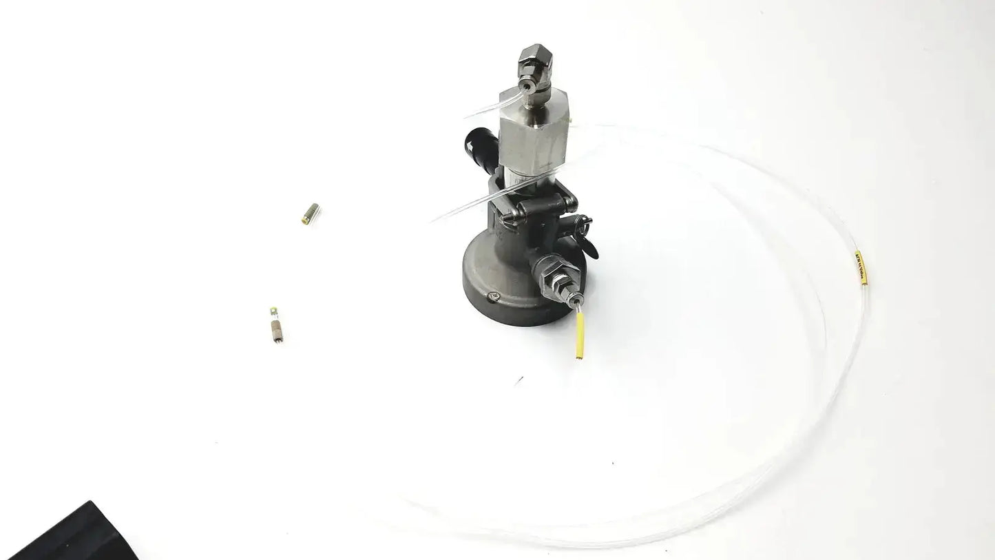 Silver and black industrial micro matic inlet keg coupler with transparent tubing maximum working pressure 12 psi