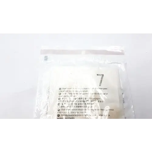 A clear plastic bag containing white, soft-textured filter papers with printed instructions in multiple languages.