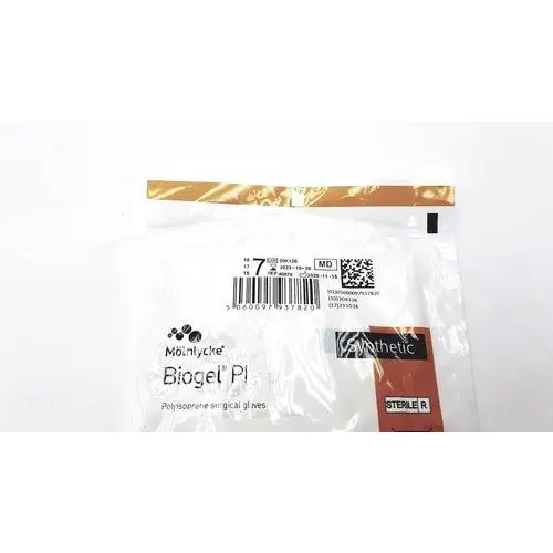 Sterile, white mönlycke biogel pl polyisoprene surgical gloves in a clear plastic package with gold-sealed top.