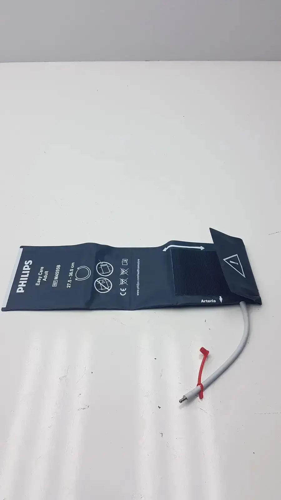 Philips easy care adult blood pressure cuff ref m4555b navy blue with white text and symbols for arm circumference 27.5-36 cm