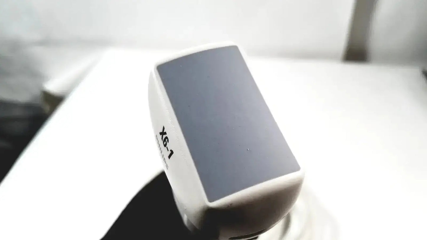 White philips x6-1 matrix array ultrasound transducer probe with dark gray screen and printed model number on side