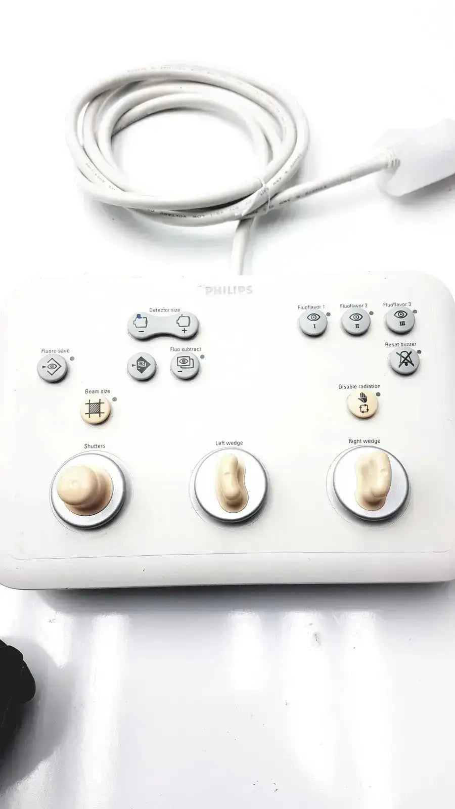 White Philips operator imaging module mono c controller with three large beige knobs and multiple labeled buttons