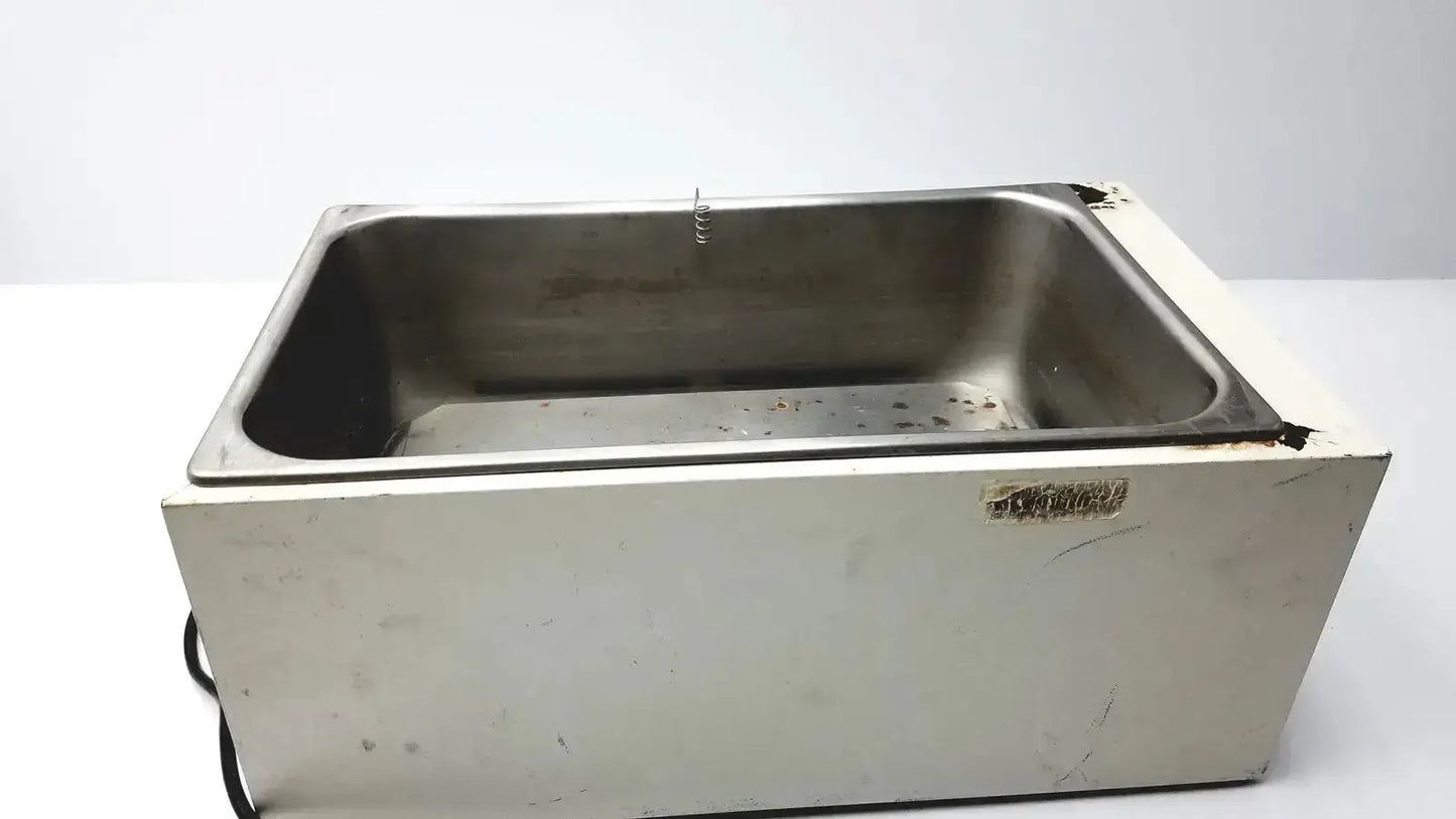 Stainless steel rectangular ultrasonic cleaner with white plastic base and wear edges in precision 51221050 water bath for pre owned medical equipment sale
