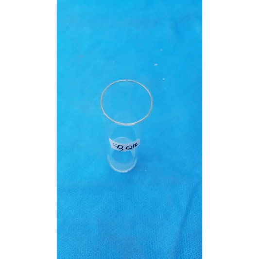 Clear glass test tube with a white label bearing black text.