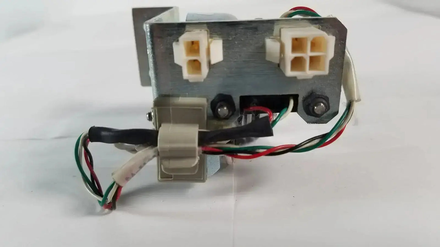 Gray metal electrical component with beige plastic connectors and multicolored wires from saia burgess ledex products hospital surplus