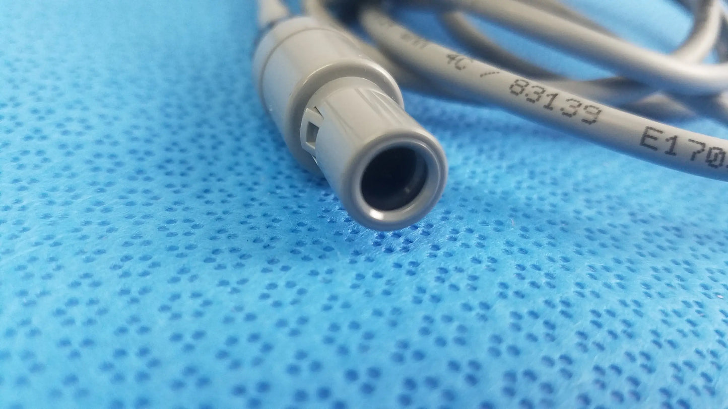 Gray medical-grade cable with cylindrical metallic connector and serial numbers for stokert smartablate system foot pedal ref m490005 medical equipment reuse