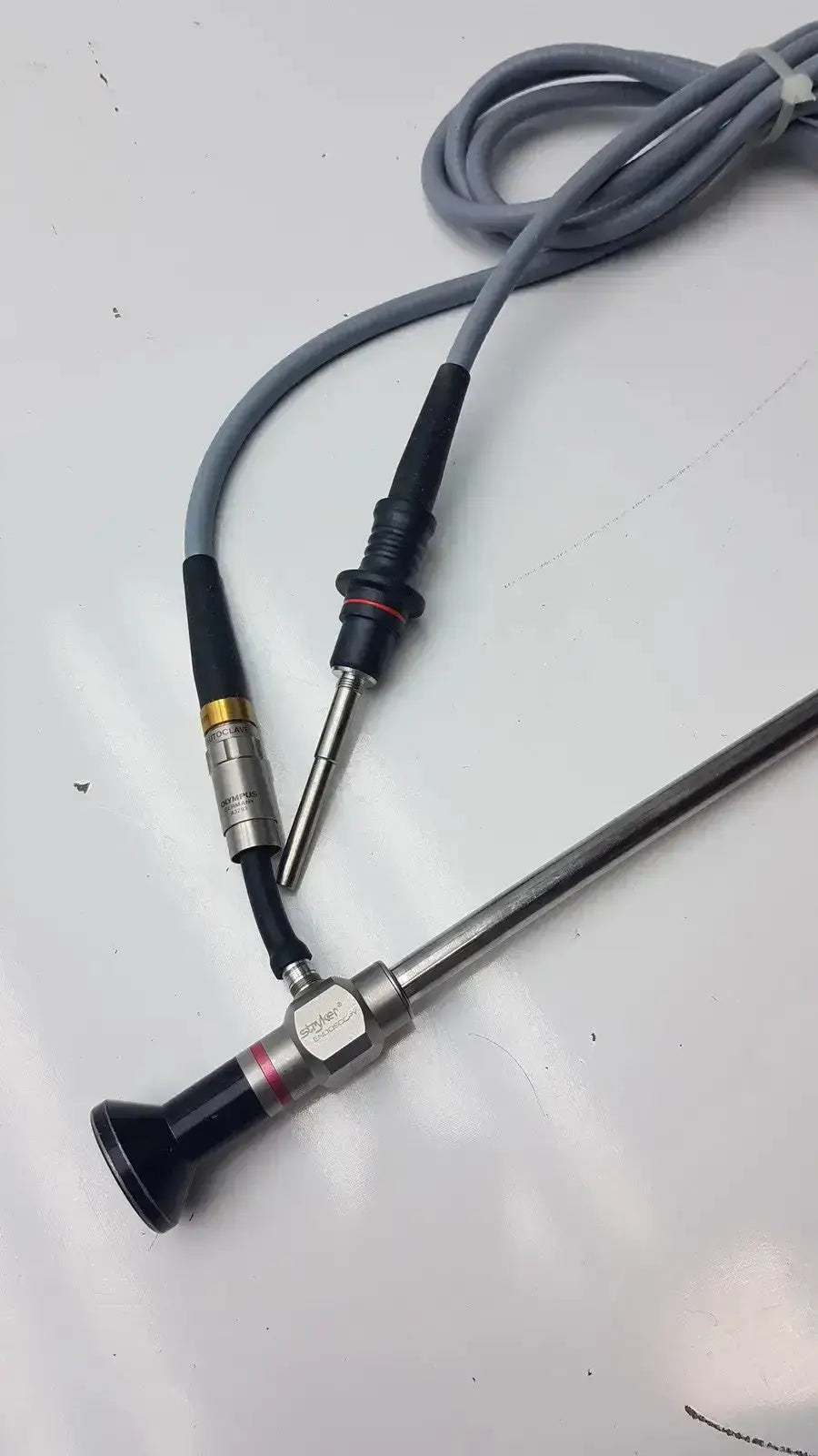 Stryker 0º 380-10 autoclavable laparoscope with olumpus germany a3293 metallic shaft black silver connectors and gray cables