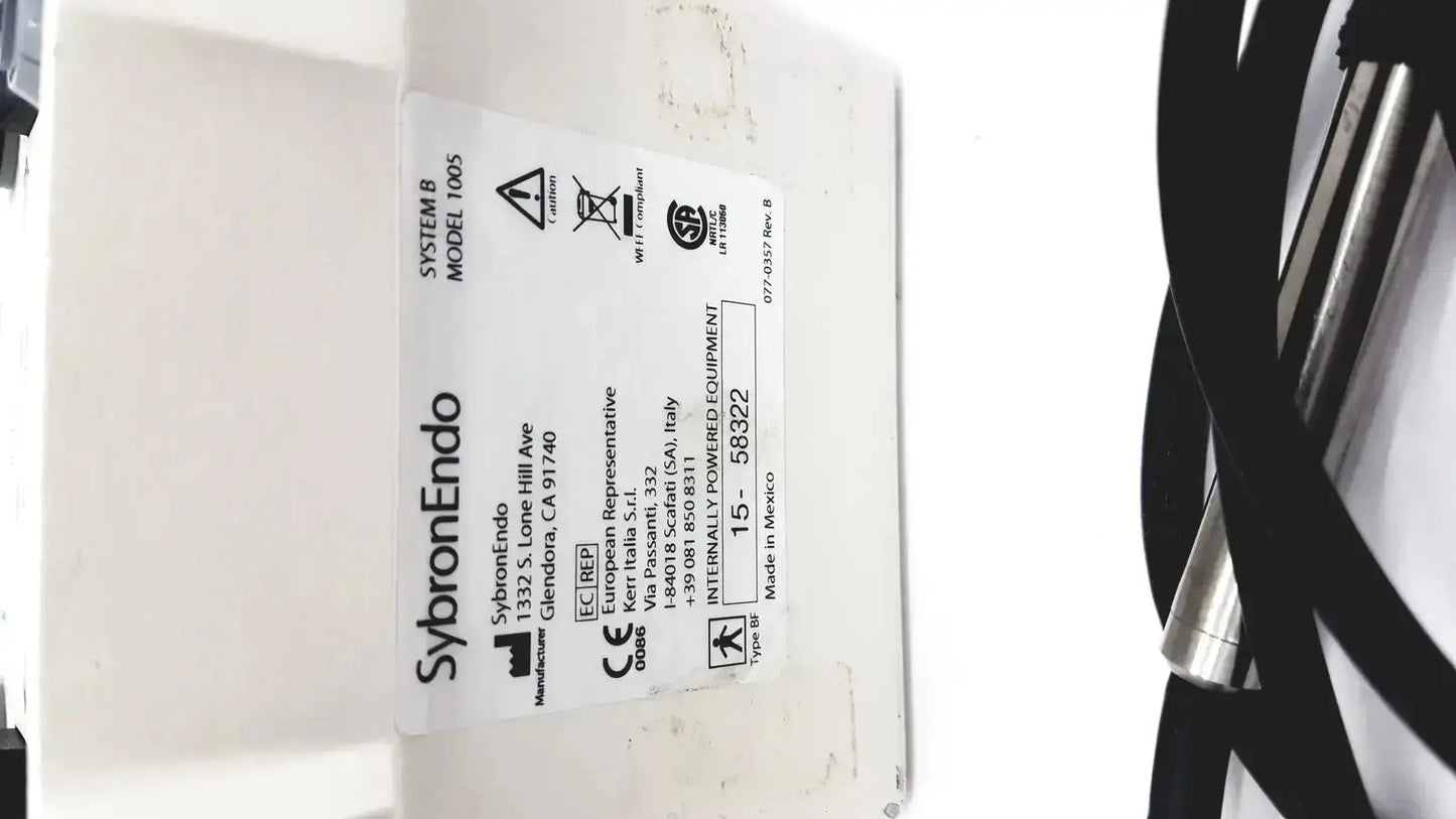 White rectangular label with black text for sybronendo system b model 1005 dental endo heat source instrument