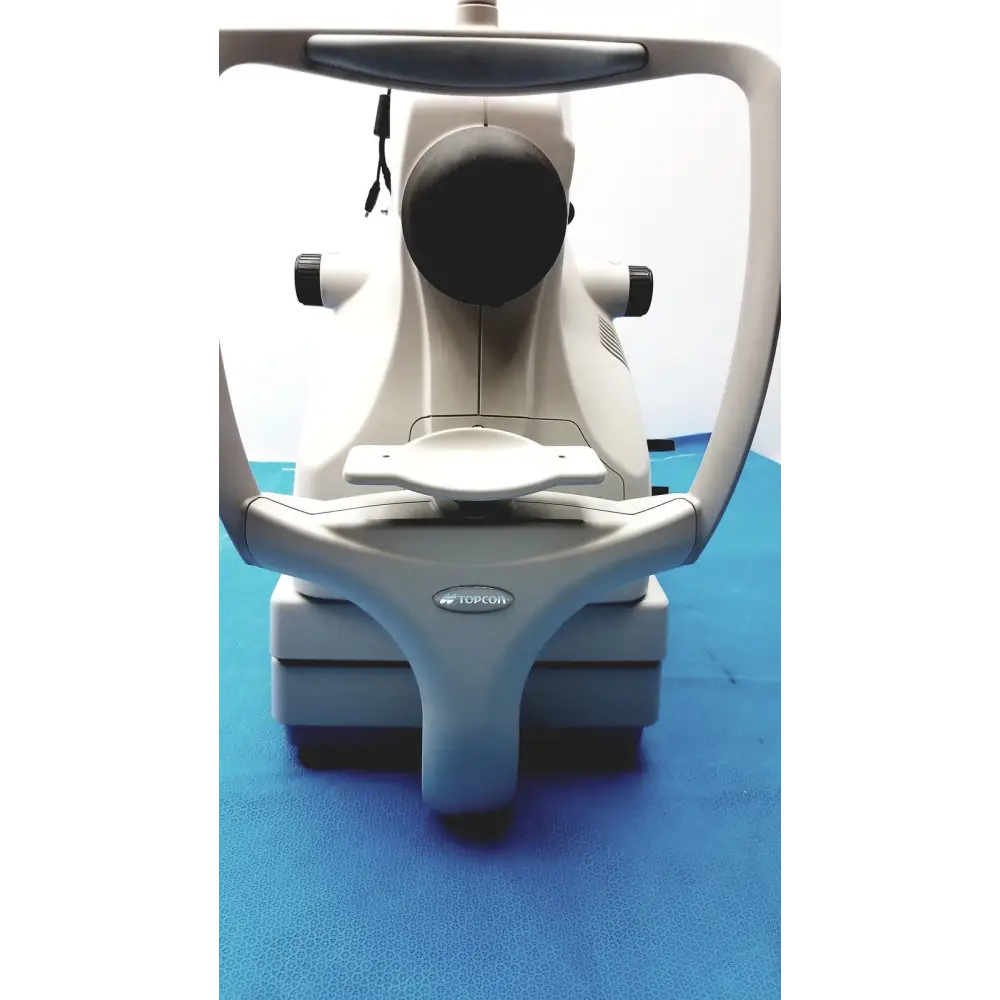 White and gray topcon slit lamp biomicroscope with a black circular lens housing.