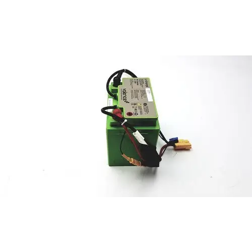Green rectangular battery with black wiring and connectors.