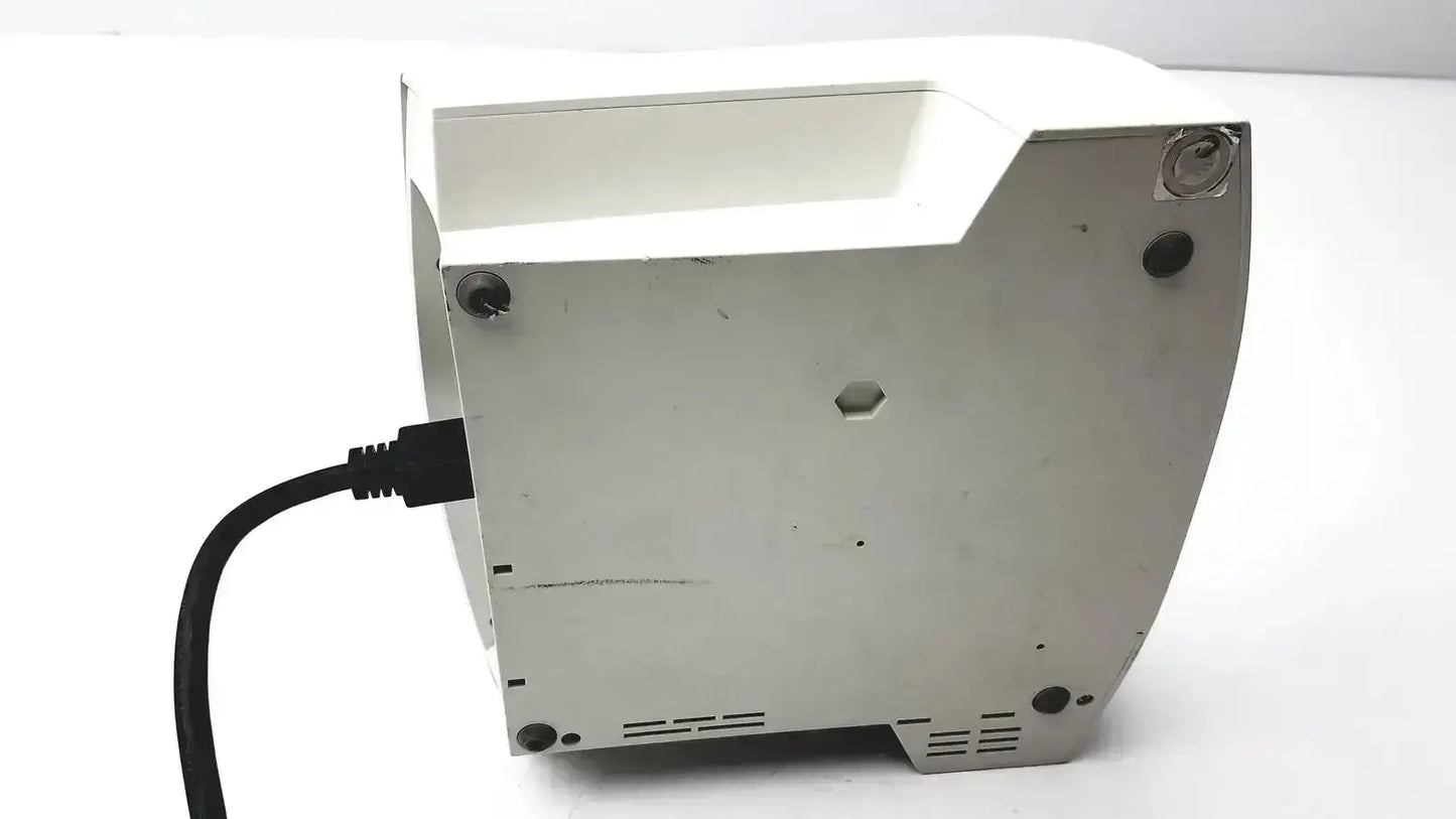 White plastic toaster with black power cord plugged in shown from the back side for astra tech handpiece unit use