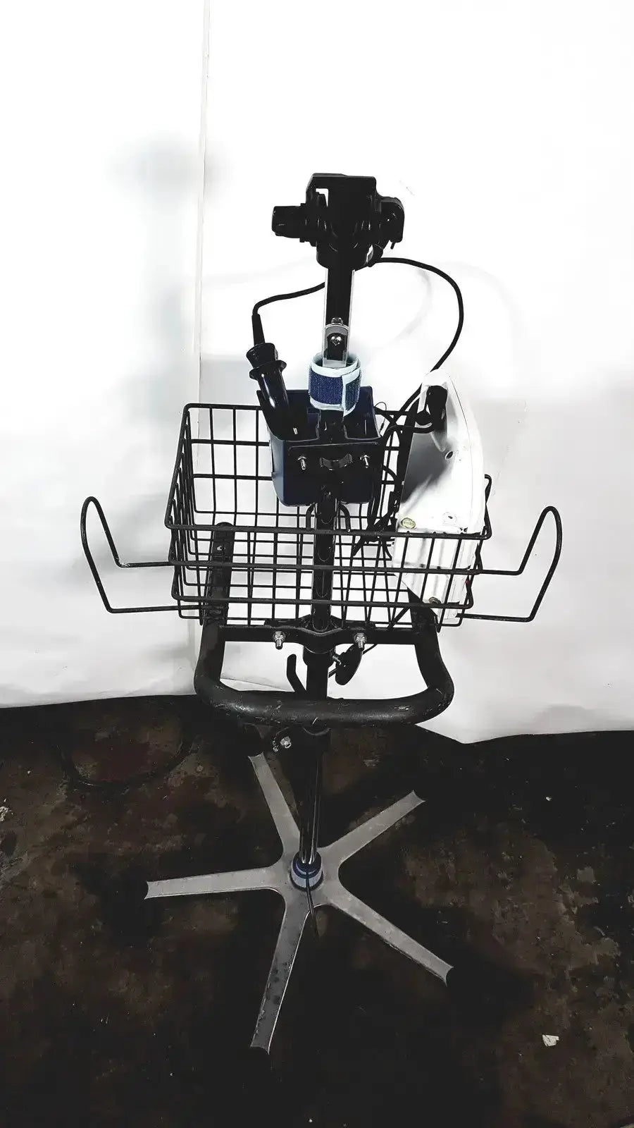 Black metal bicycle basket stand with camera mounted on top for welch allyn glidescope cobalt avl monitor cart and stand