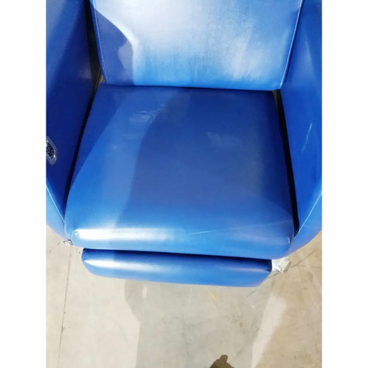 Blue leather recliner chair with a glossy finish and padded armrests.