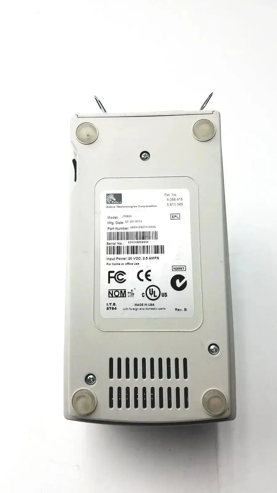 Silver metallic power supply unit with technical label for zebra lp2824 thermal label printer untested back view