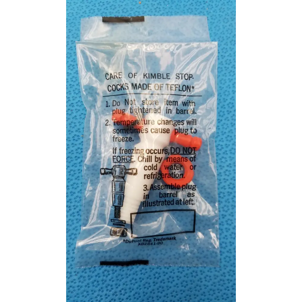 Orange teflon plug for kimble stopcock, packaged in clear plastic with care instructions.