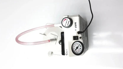 White precision medical easy suction machine with transparent tubing and pressure gauge for medical use