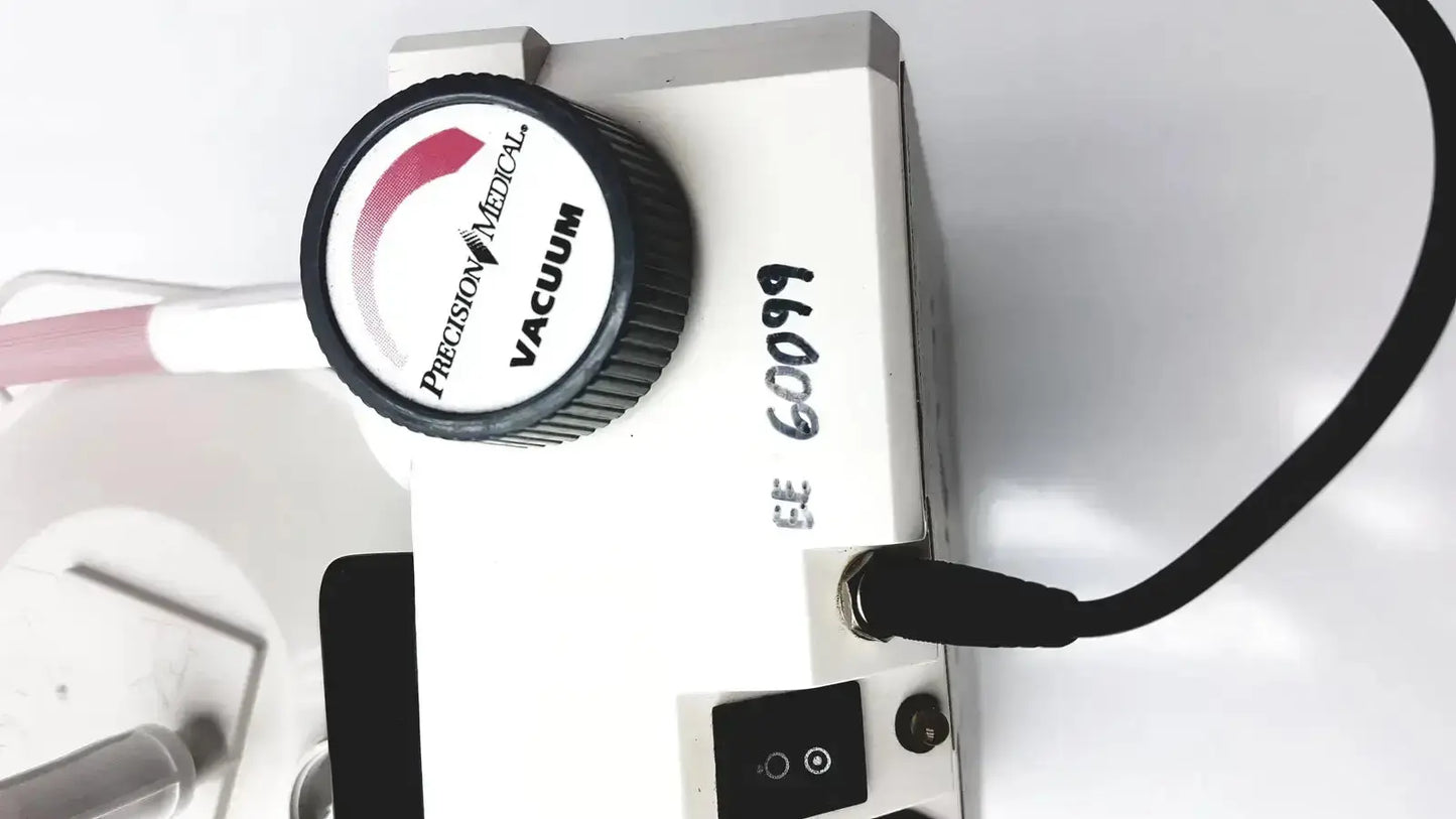 White precision medical easy go vac aspirator vacuum pump with black knob and labeled model number for medical use