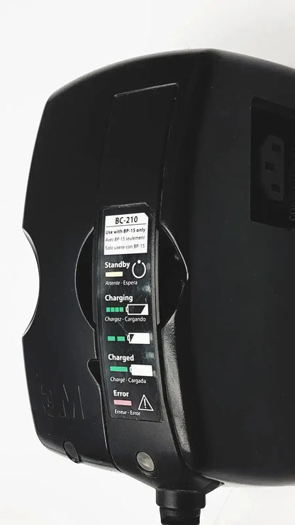 Black plastic 3m bc-100 smart battery charger power base bc-210 with status indicators and warning label