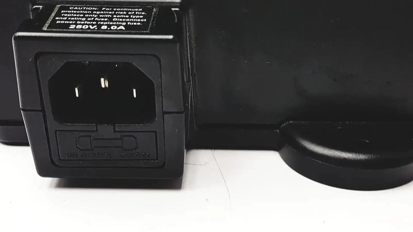 Black plastic 3m bc-100 smart battery charger power base bc-210 with rectangular input port and molded safety label back view