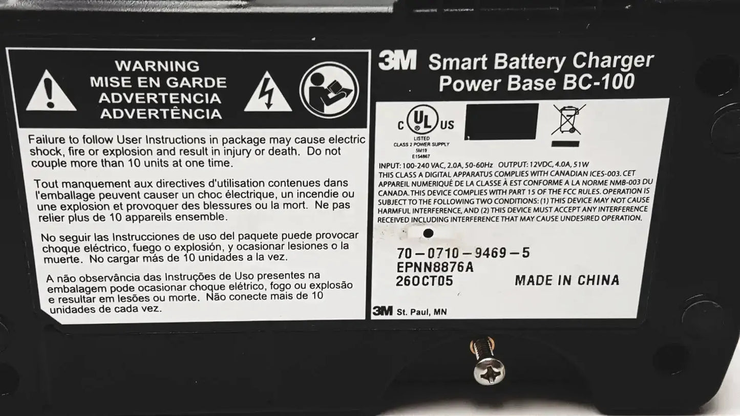 Black 3m bc-100 smart battery charger power base with white labeling and safety warnings in bc-210 model product image