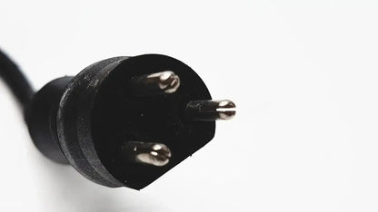 Black three-prong electrical plug with metallic contacts on the back of 3m bc-100 smart battery charger power base bc-210