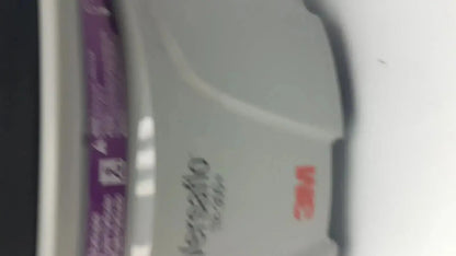 Gray 3m tape dispenser with purple label and red logo for versaflo tr-301n+ blower and tr-300n+ respirator use