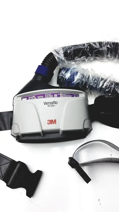 3m versaflo tr-300+ respirator with gray and black housing, blue hose connector, and clear face shield for buy used medical equipment