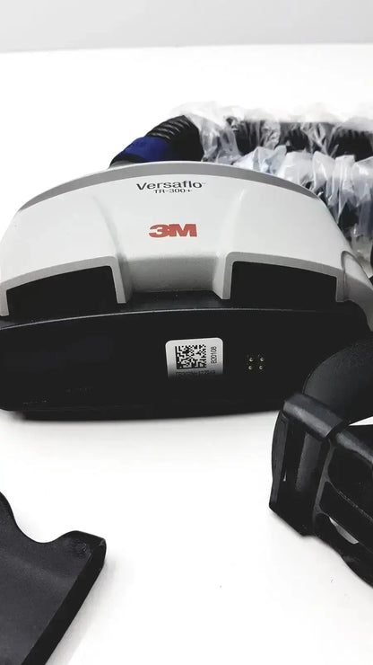 White and black 3m versaflo tr-300+ powered air purifying respirator with a sleek ergonomic design for medical use