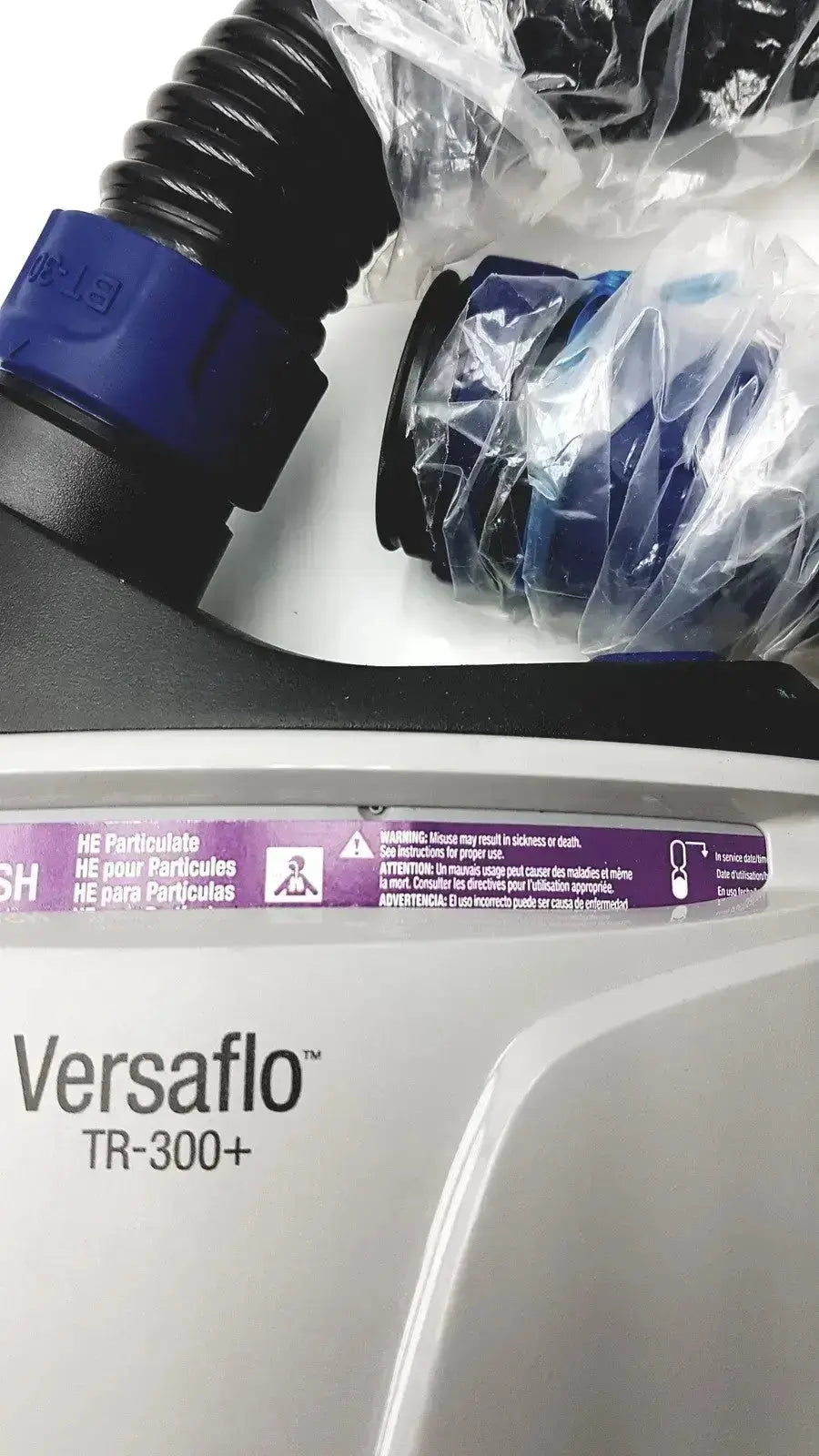 Silver versaflo tr-300+ hepa filter housing with black corrugated tubing and blue connectors for pre owned medical equipment use