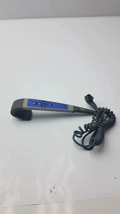 Gray and blue 4-button wired handset with coiled black cable for arjo lift use