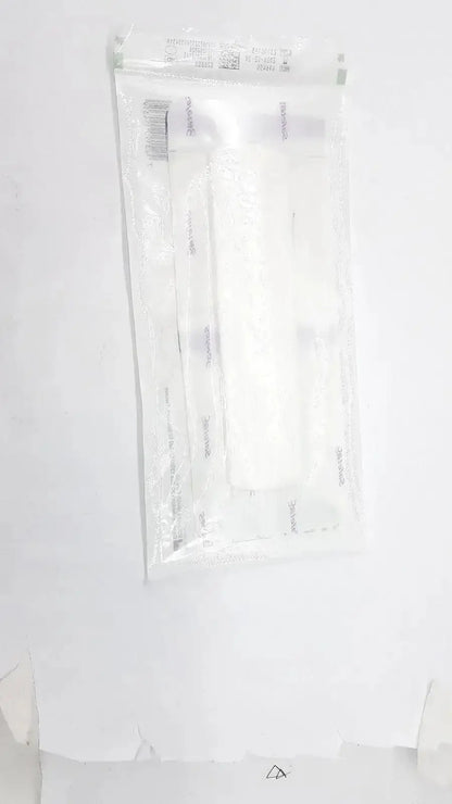 A clear plastic pouch containing sterile white cotton swab and syringes for mepliex border post-op 4 x 12 inches