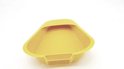 Yellow plastic medegen fracture bedpan with rectangular opening and rounded edges for medical use 1.1 quart capacity