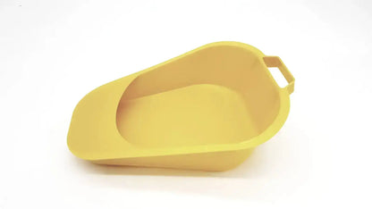 Yellow plastic Medegen fracture bedpan with molded handle 12 inch 1.1 quart capacity for medical use