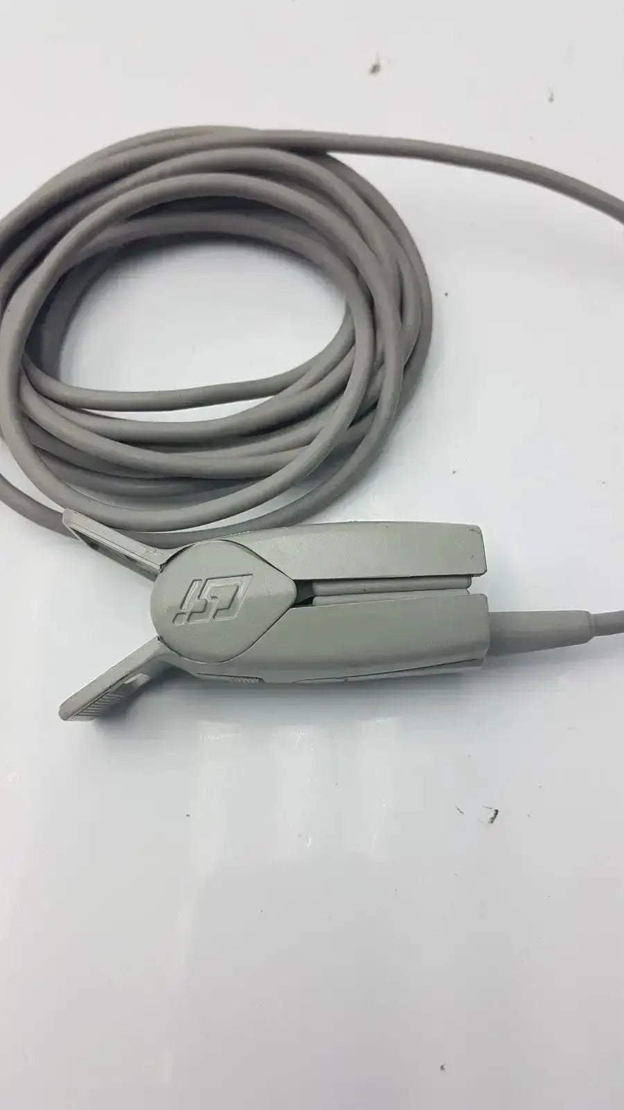 Gray medical 6-pin spo2 finger clip with ergonomic design and subtle logo for adult finger clip cable use