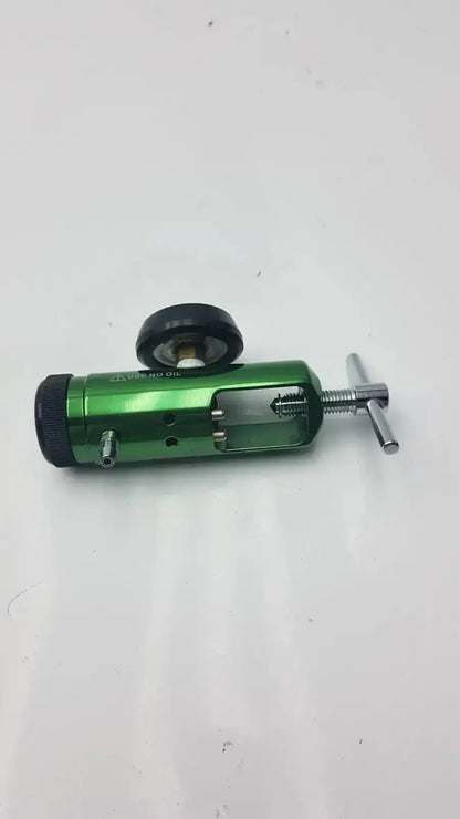 Green metallic medical oxygen regulator with black knob and handle for precise oxygen control by Access Point Medical Oxygen Regulator