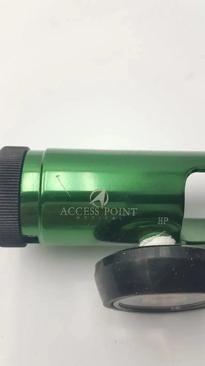 Green metallic medical oxygen regulator with black rubberized grip and access point medical branding for oxygen delivery