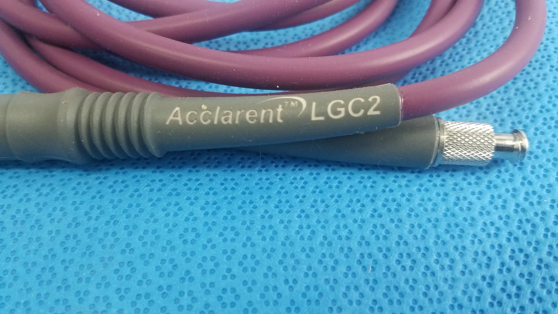 Acclarent lgc2 fiber optic light guide cable with maroon coating gray ribbed handle and metallic connector for medical equipment reuse