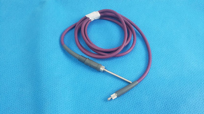 Purple coiled acclarent lgc2 fiber optic light guide cable with gray connectors and metallic probe for medical equipment reuse