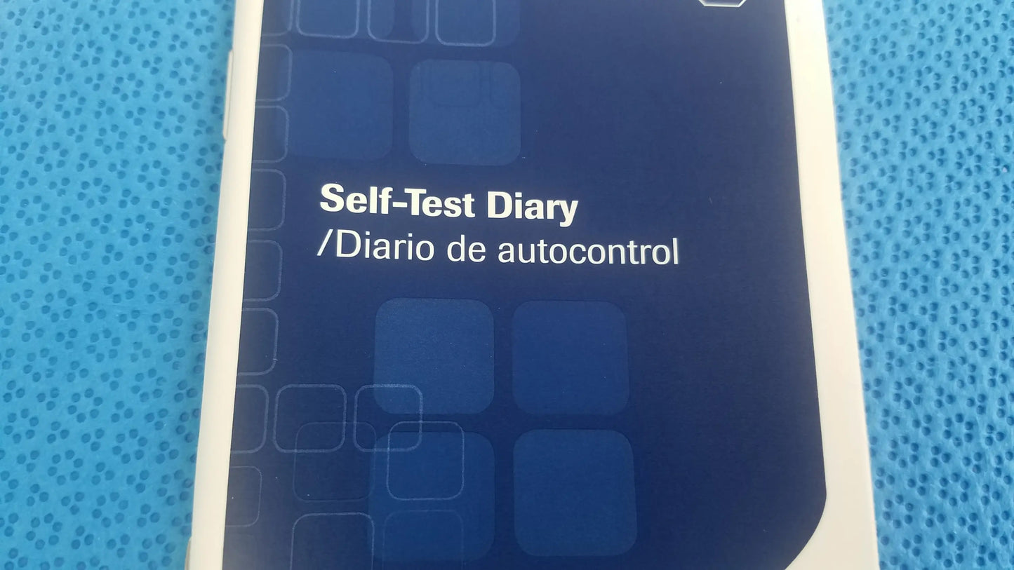 Blue and white self-test diary booklet with geometric design for aviva blood glucose medical equipment monitoring system bag