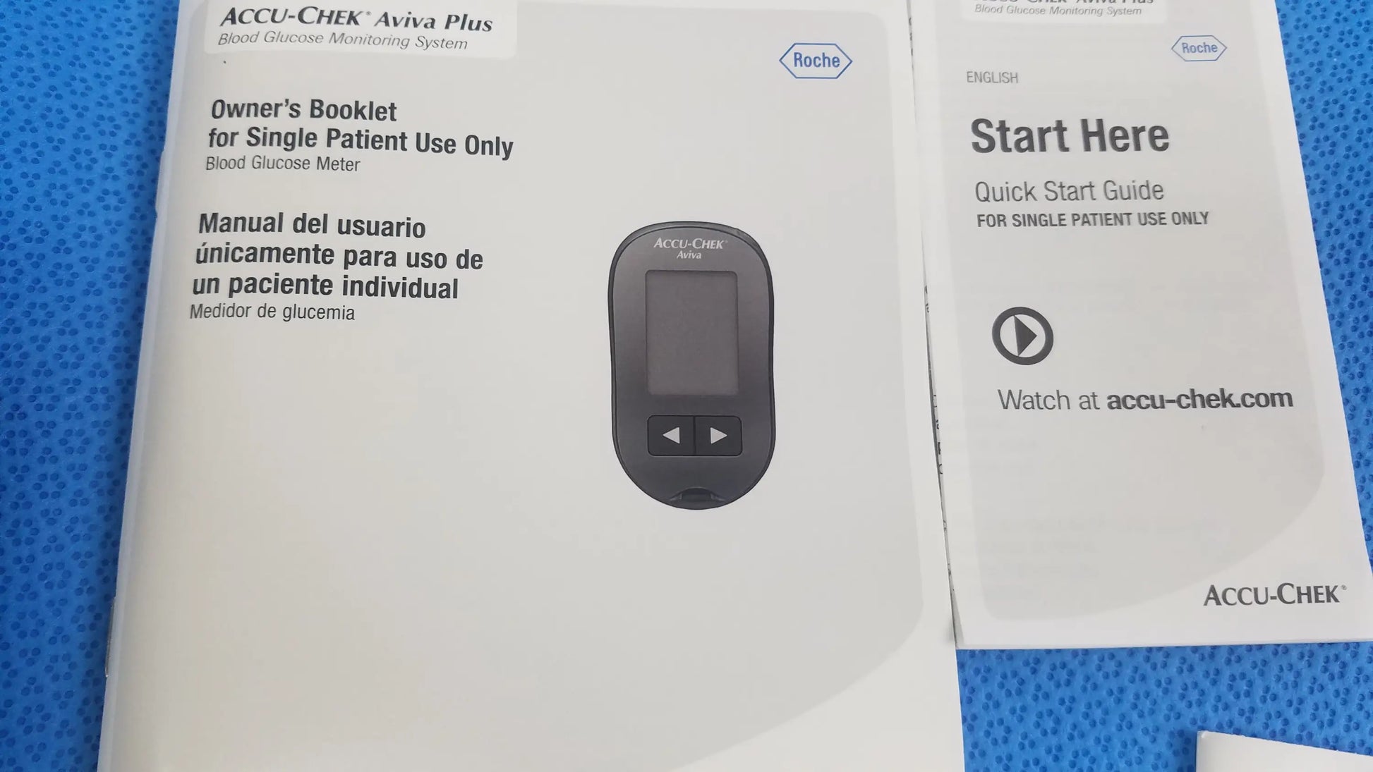 Black plastic accu-chek aviva plus blood glucose meter with small screen and two buttons for medical equipment use