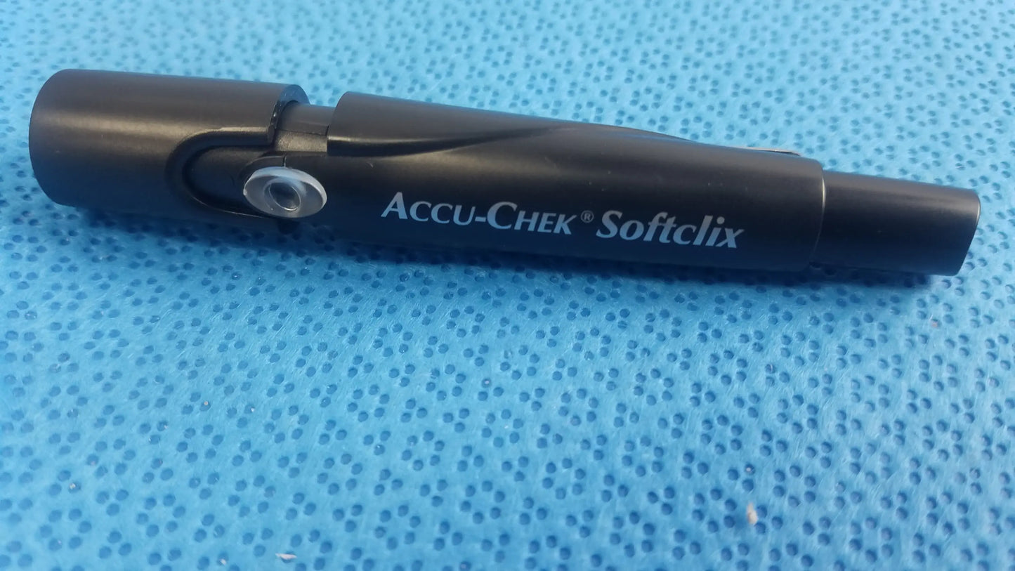 Black accu-chek softclix glucose meter test strip holder with silver detail for aviva blood glucose medical equipment use