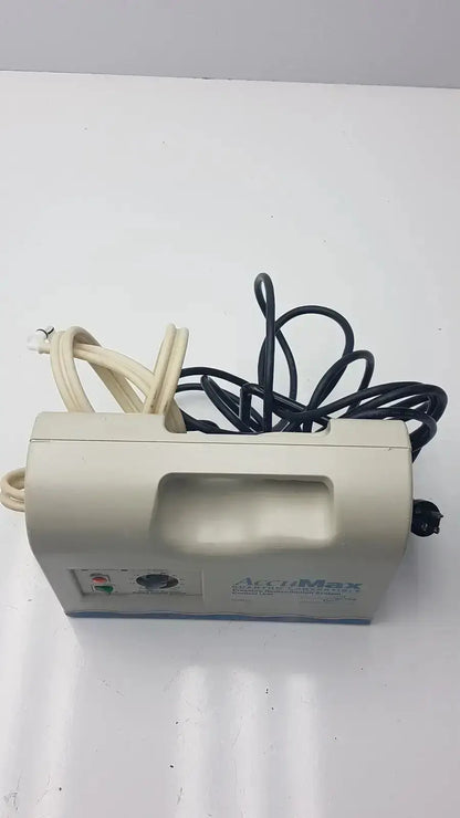 Beige plastic accumax quantum convertible pressure redistribution pump with coiled black and beige power cords