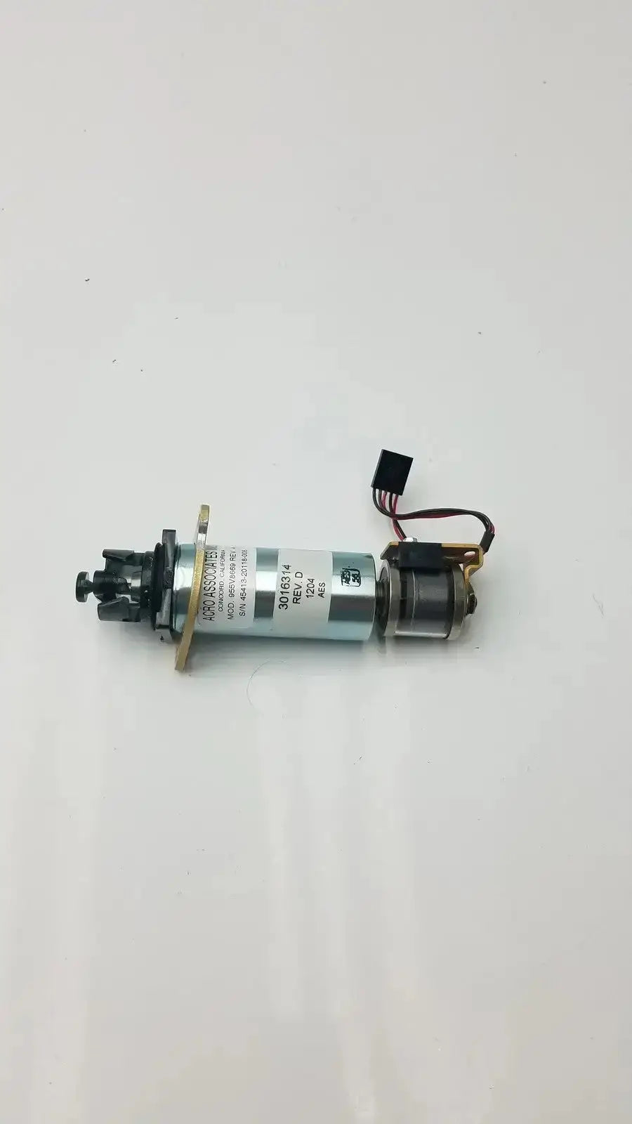 Silver cylindrical electric motor with black wiring and connector for acro associates 955v8669 rev a valve