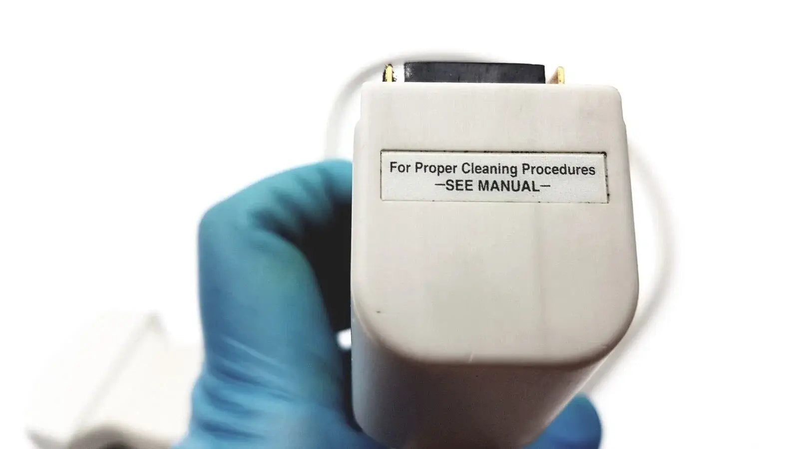 White plastic acuson c3 needle guide convex array ultrasound transducer probe with gold connectors and cleaning label